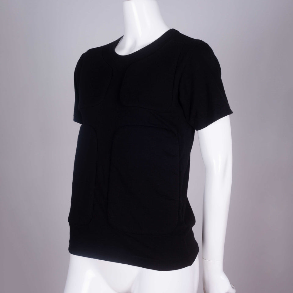 Comme des Garçons 2016 black crew neck tee from Japan with four sections of padding on the front chest and torso.