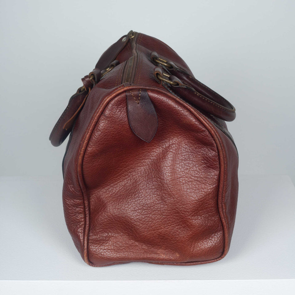 Comme des Garçons small, brown and burnt sienna leather Boston bag from Japan.