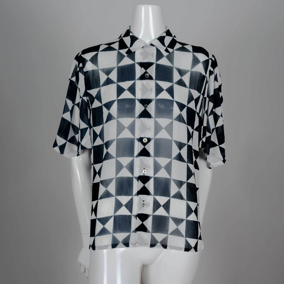 Comme des Garçons 1989 chiffon blouse from Japan with black and white geometric motif, short lantern sleeves and cut away collar.