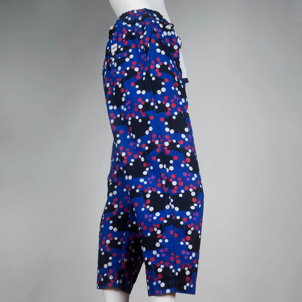 Comme des Garçons Ganryu 2012 trousers in blue with black geometric pattern, and red and white dots. 