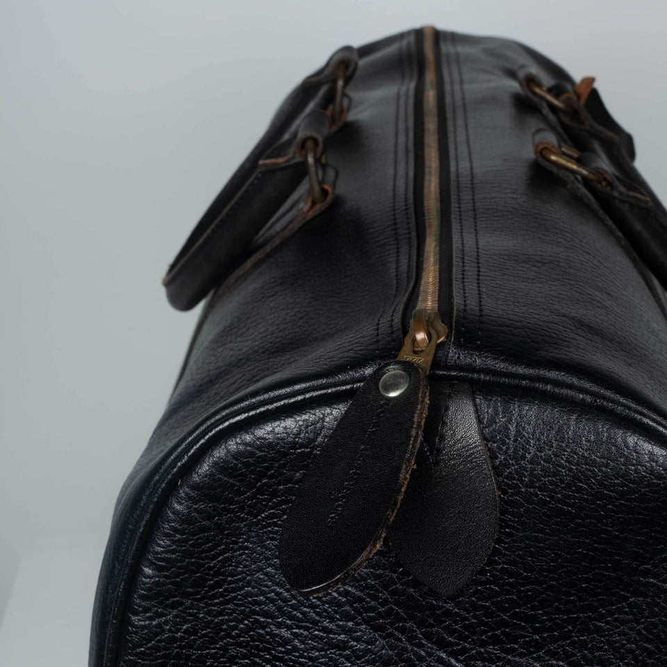 Comme des Garçons large, black leather Boston bag from Japan.