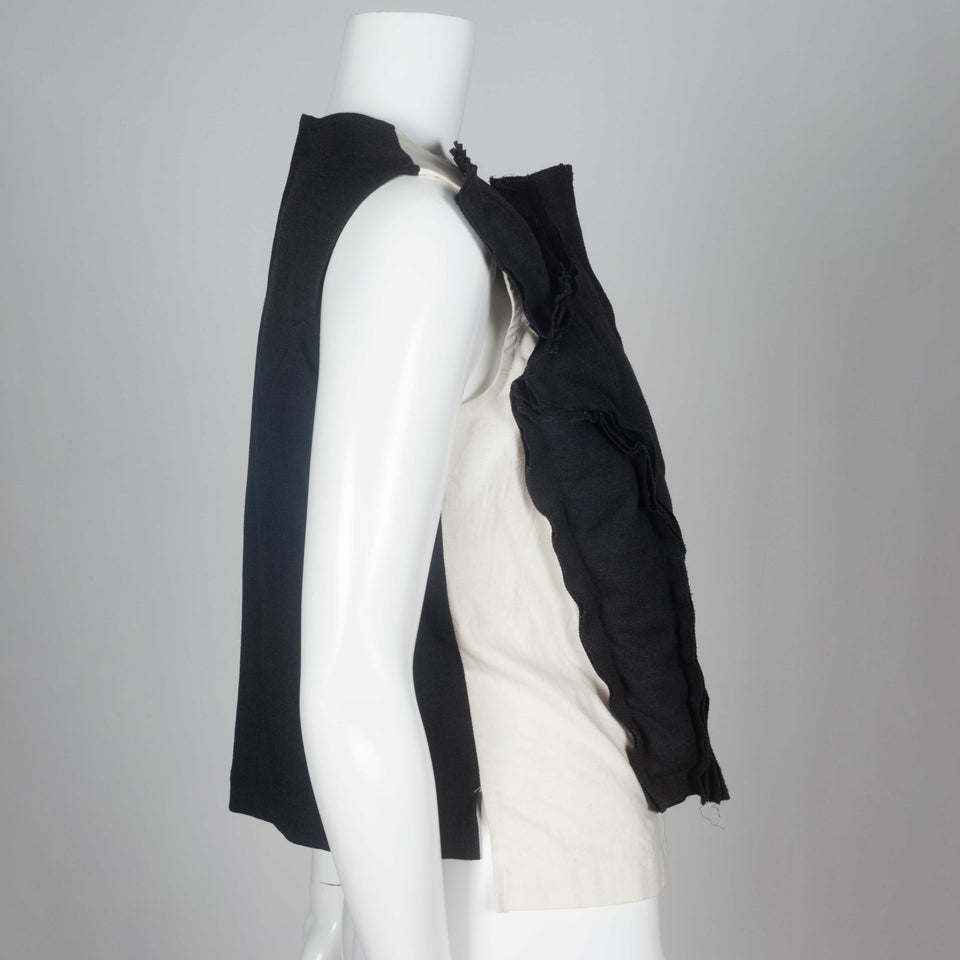 Comme des Garçons 2010 sleeveless shirt with asymmetrically padded front.