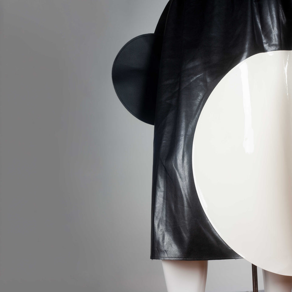 Junya Watanabe x Comme des Garçons 2014 faux leather skirt from Japan embellished with white and black circles. 