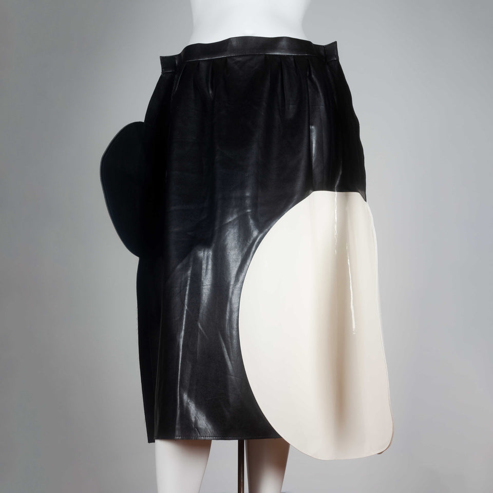 Junya Watanabe x Comme des Garçons 2014 faux leather skirt from Japan embellished with white and black circles. 