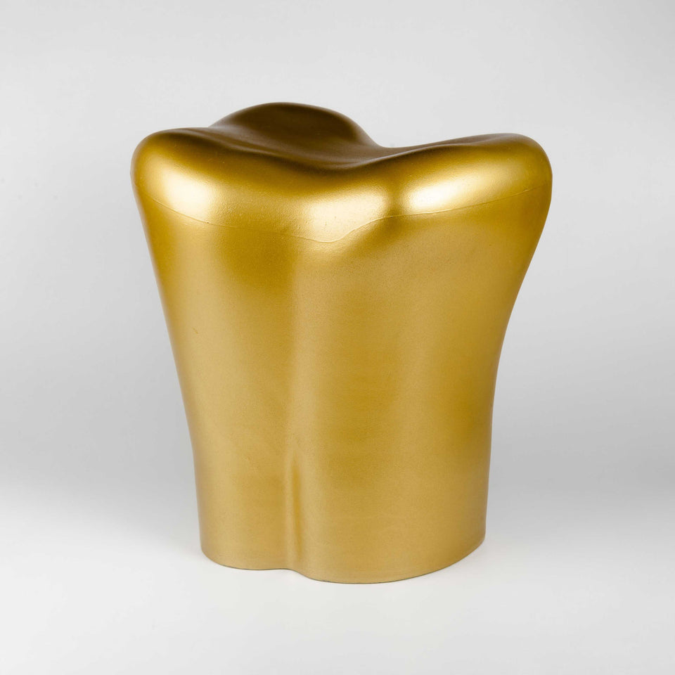 Gold tooth stool by Philippe Starck at PHX Gallery Chicago. 
