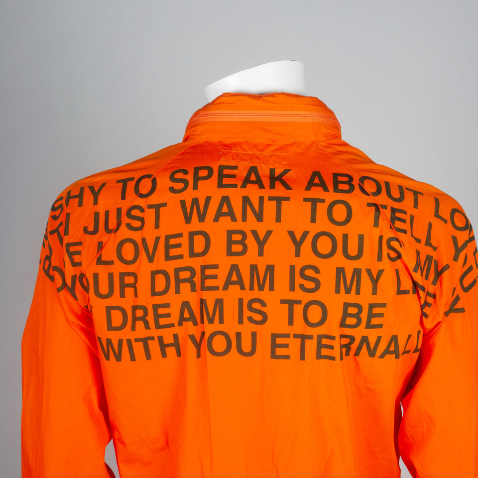Junya Watanabe Comme des Garçons 2001 poem coat from Japan in bright orange.