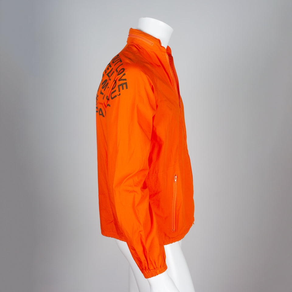 Junya Watanabe Comme des Garçons 2001 poem coat from Japan in bright orange.