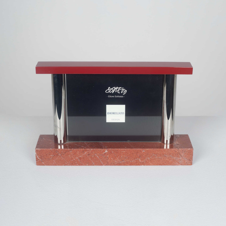 Picture frame in red marble by Italian designer, Ettore Sottsass. 